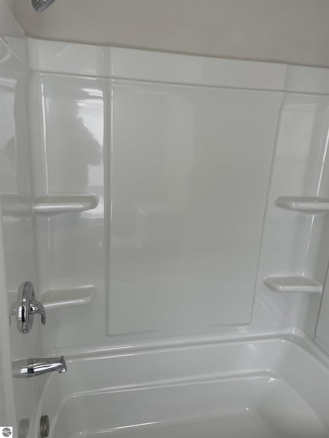 309 E Wisconsin, Mount Pleasant, MI 48858 - bathroom featuring tub / shower combination