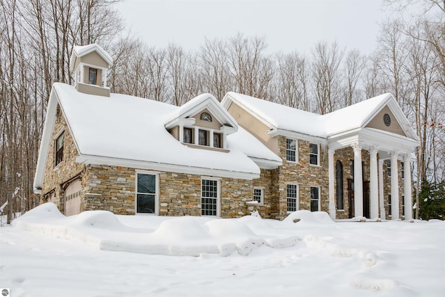 view of front of property featuring a garage