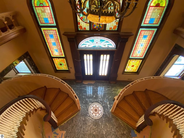 foyer entrance featuring french doors