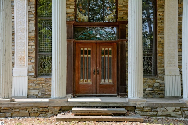 entrance to property featuring french doors