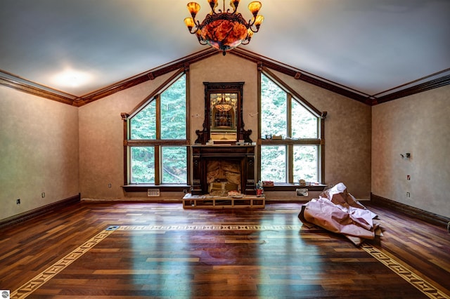 unfurnished living room featuring a wealth of natural light, crown molding, and dark wood-type flooring