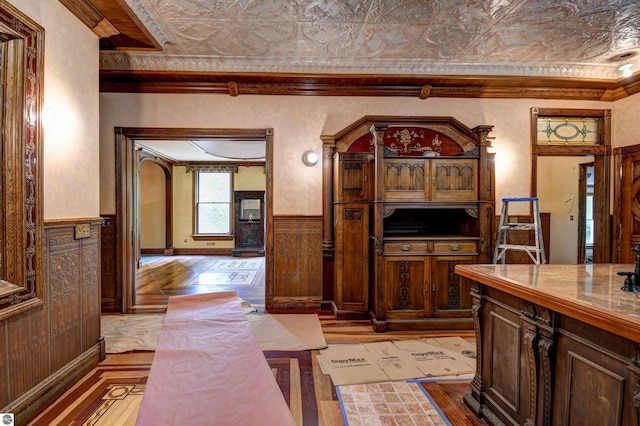 interior space with crown molding