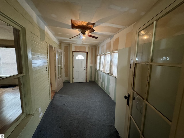 hallway with carpet