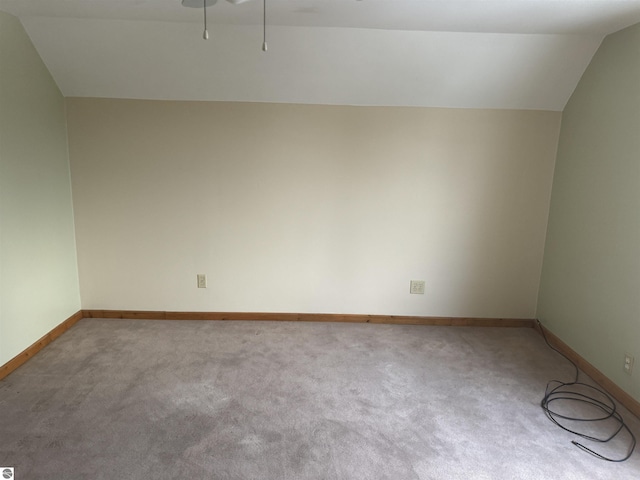 bonus room featuring carpet and lofted ceiling