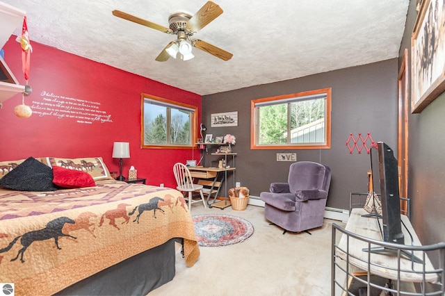 carpeted bedroom featuring a textured ceiling, a baseboard radiator, and ceiling fan