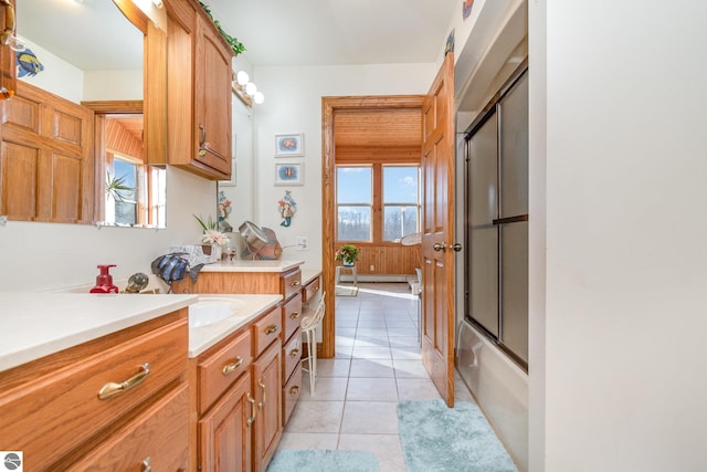 kitchen featuring decorative light fixtures and light tile patterned flooring