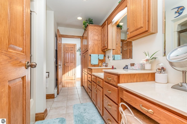 bathroom featuring tile patterned floors and vanity