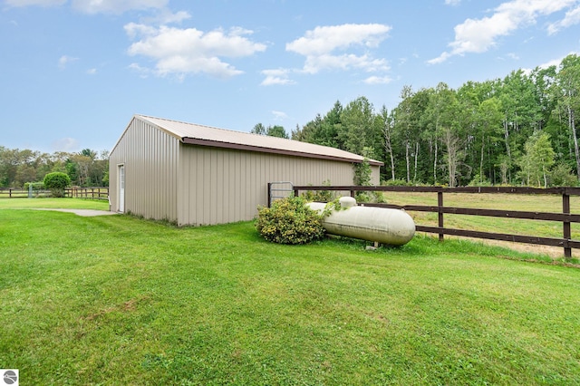 view of outdoor structure with a yard