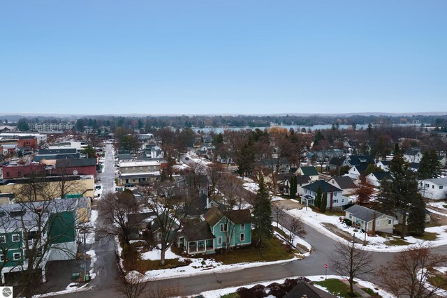 snowy aerial view featuring a residential view