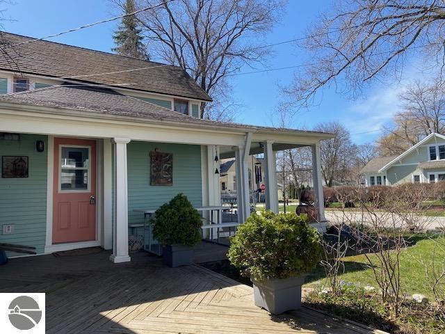 doorway to property featuring a porch