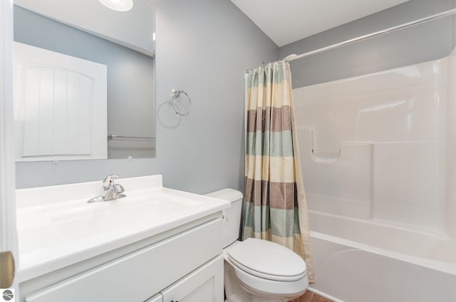 full bathroom featuring vanity, toilet, and shower / bath combo with shower curtain