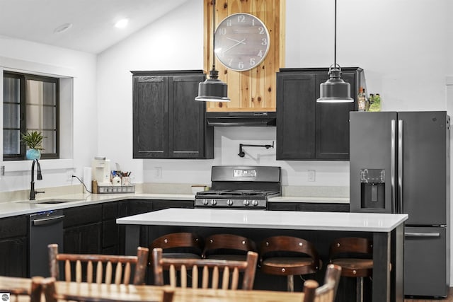 kitchen with lofted ceiling, black appliances, sink, hanging light fixtures, and extractor fan