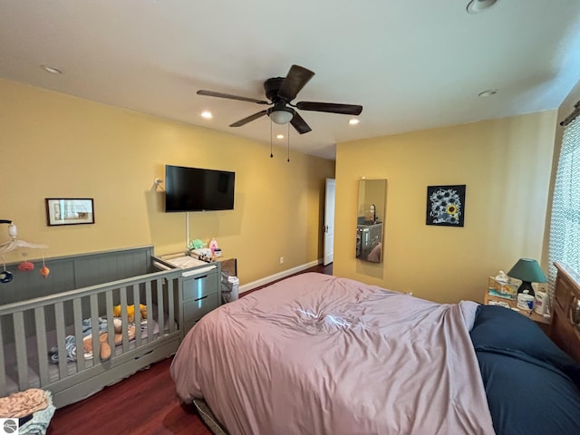 bedroom with hardwood / wood-style flooring and ceiling fan