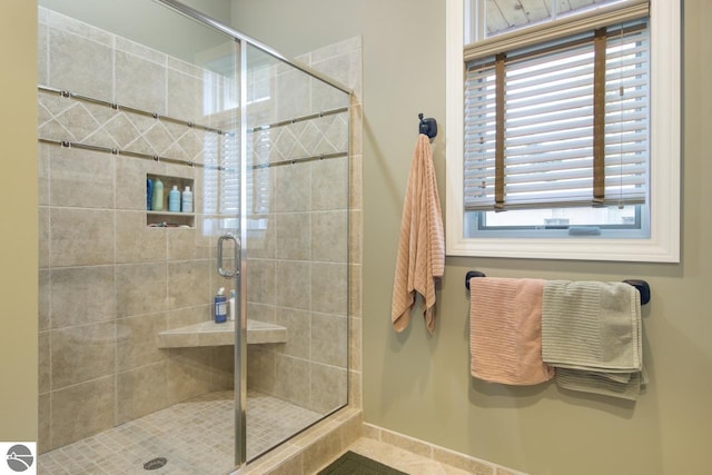 bathroom featuring an enclosed shower