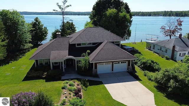 birds eye view of property featuring a water view