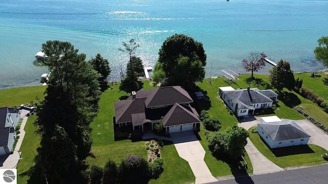 birds eye view of property featuring a water view