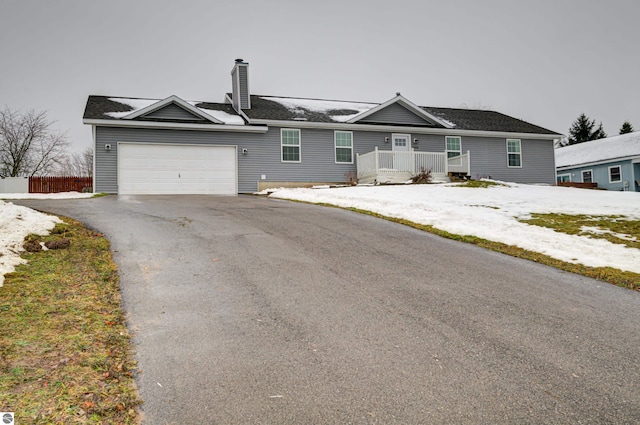 single story home with a garage