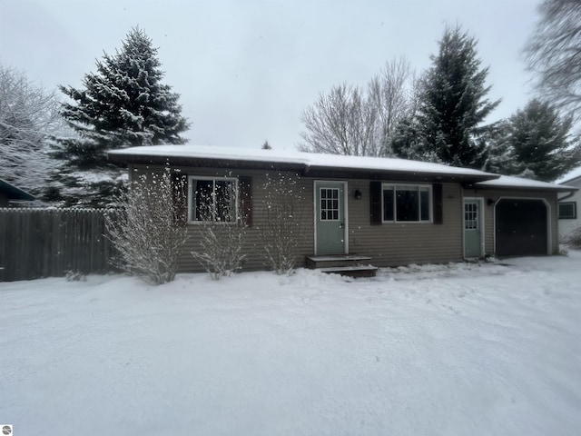 view of front of home with a garage