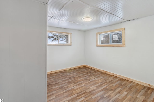 spare room featuring hardwood / wood-style flooring