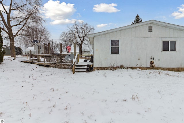 view of snow covered property