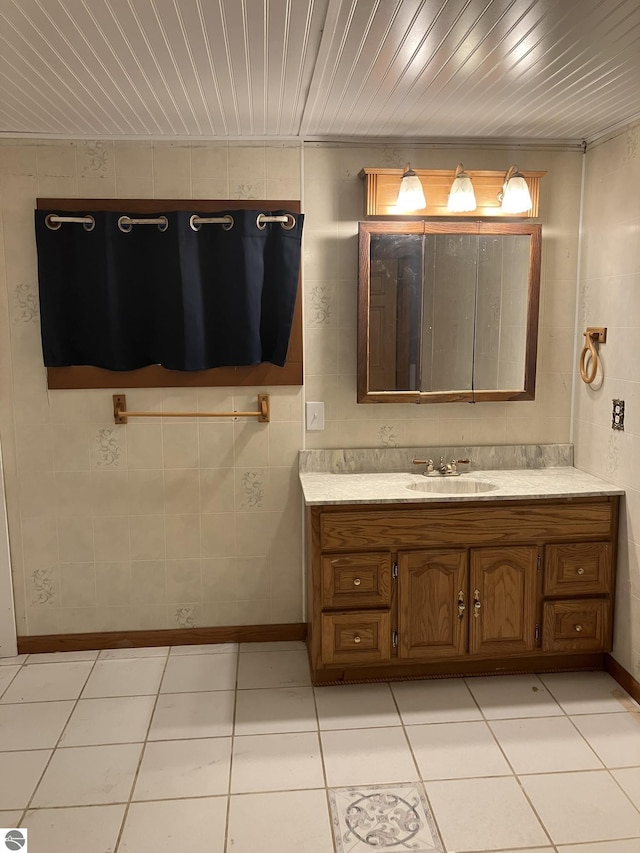 bathroom featuring tile patterned floors, vanity, and wood ceiling