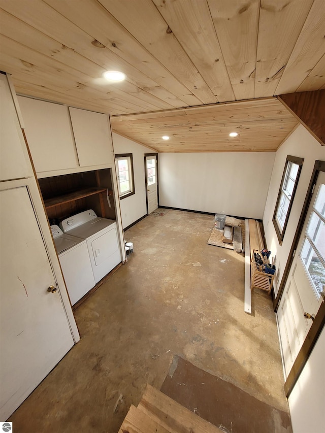 basement featuring washer and clothes dryer and wooden ceiling