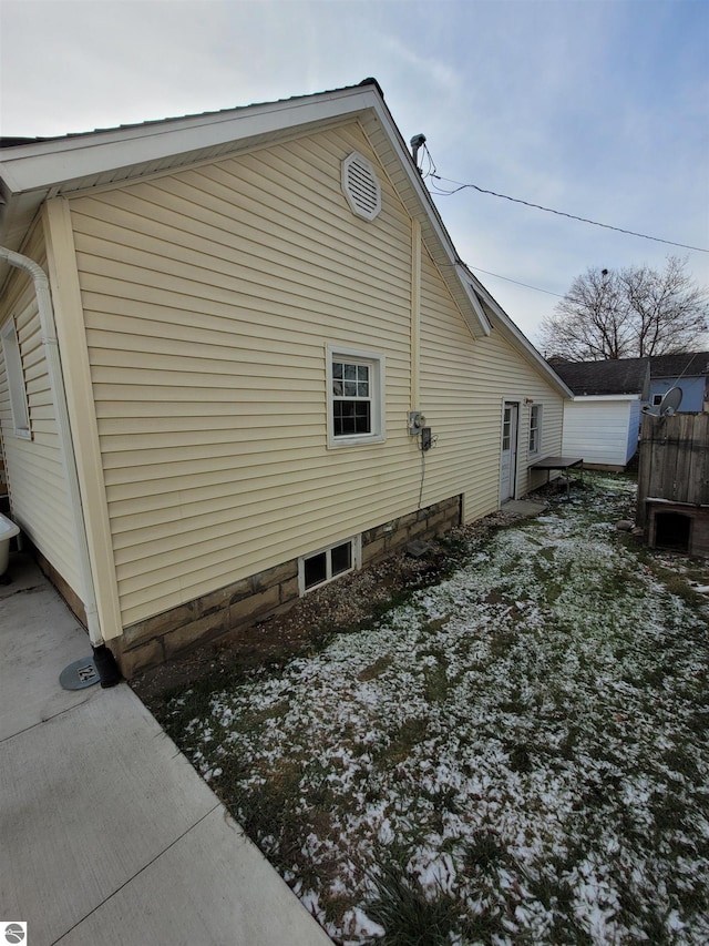 view of snow covered property