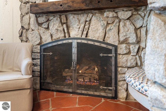 room details with a stone fireplace