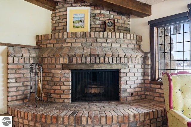 details featuring a brick fireplace