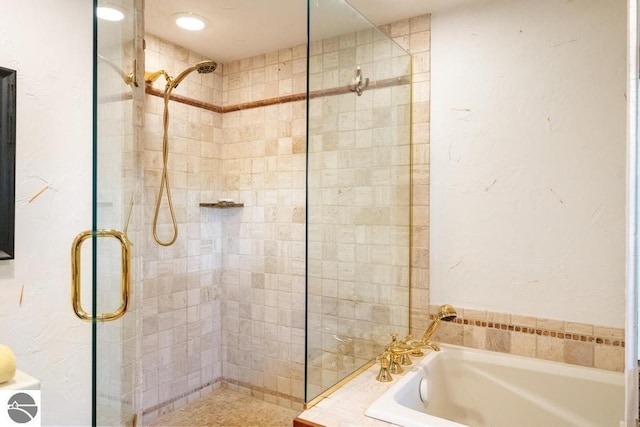 bathroom with independent shower and bath