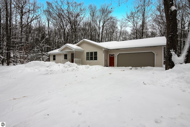 ranch-style house featuring a garage