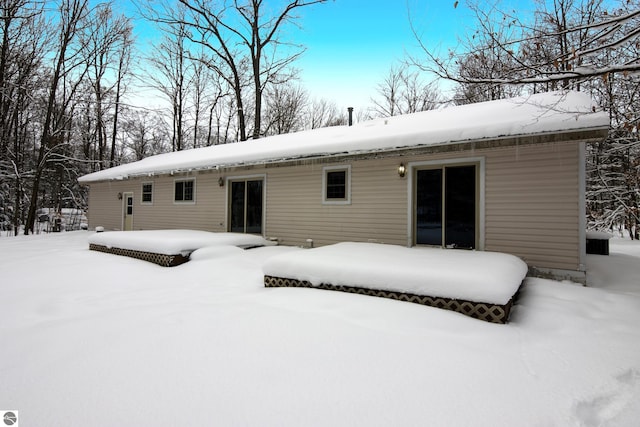 view of snow covered property