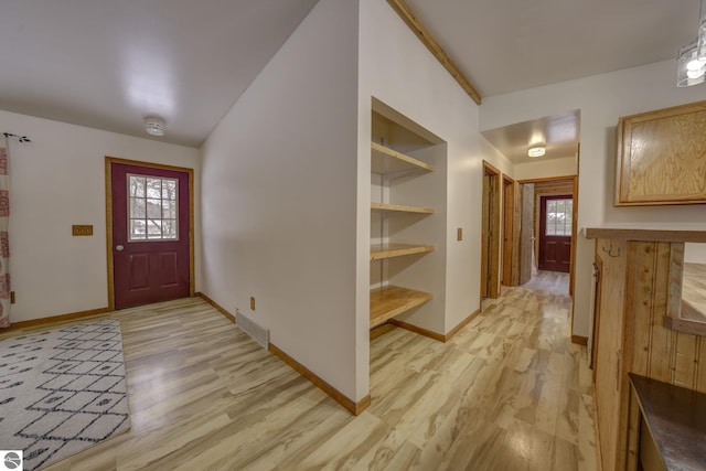 entryway with light wood-type flooring