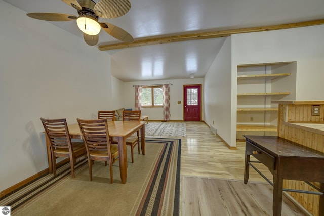 dining area with light hardwood / wood-style flooring, vaulted ceiling, and ceiling fan