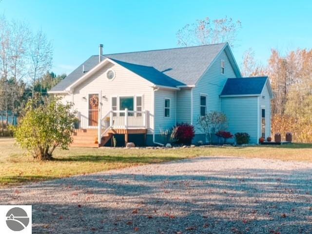 view of front of home with a front yard