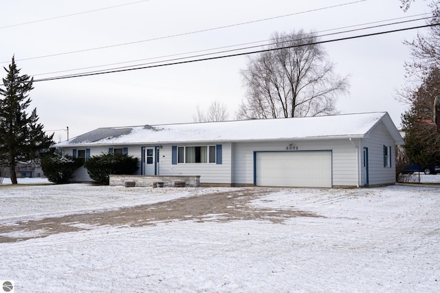 single story home with a garage