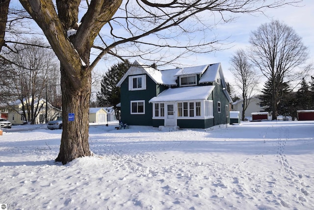 view of snow covered property