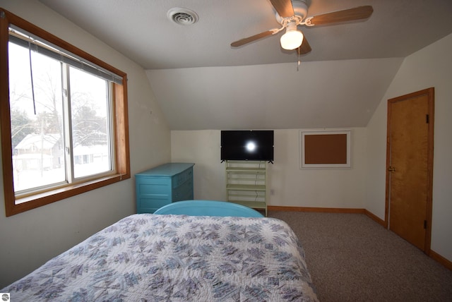 bedroom featuring ceiling fan, carpet floors, and vaulted ceiling