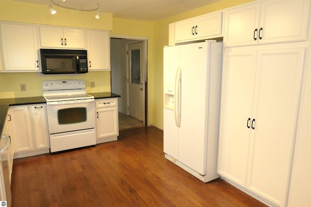 kitchen featuring white cabinets, dark hardwood / wood-style floors, and white appliances