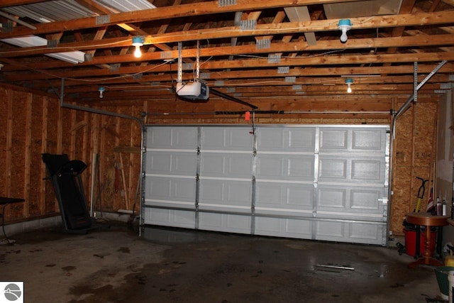 garage featuring a garage door opener