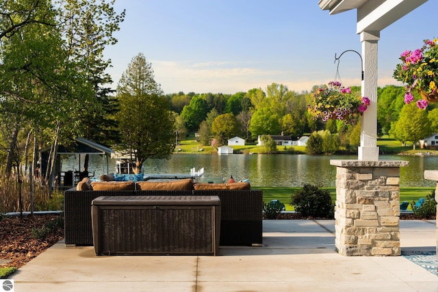 view of patio featuring central air condition unit and a water view