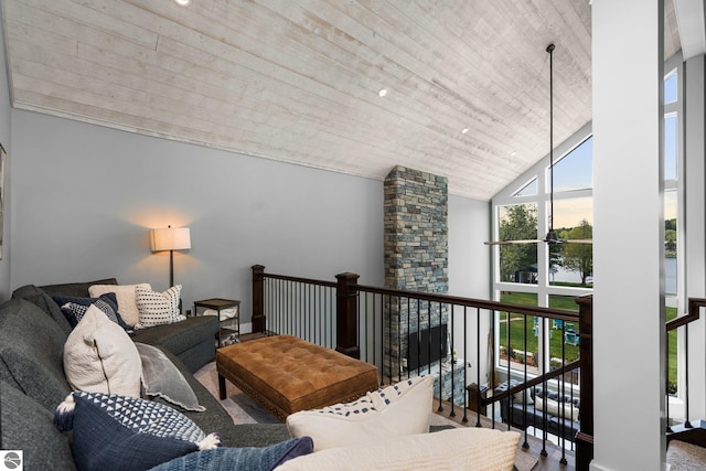 living room with a water view, wooden ceiling, a wall of windows, and vaulted ceiling