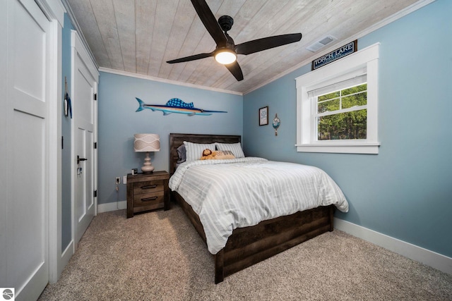 bedroom featuring carpet flooring, ceiling fan, crown molding, and wood ceiling