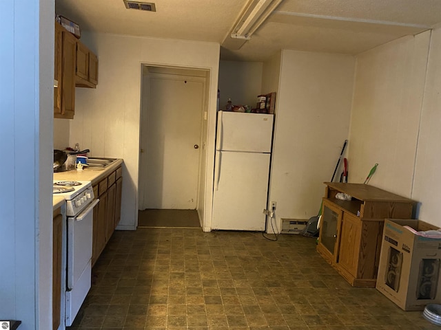 421 N Michigan Ave, Manton, MI 49663 - kitchen with white appliances