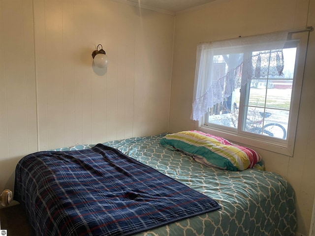 421 N Michigan Ave, Manton, MI 49663 - bedroom with wood walls