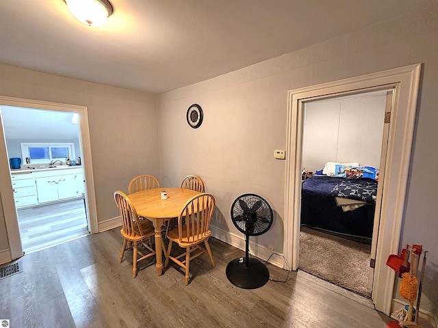 dining room featuring wood-type flooring