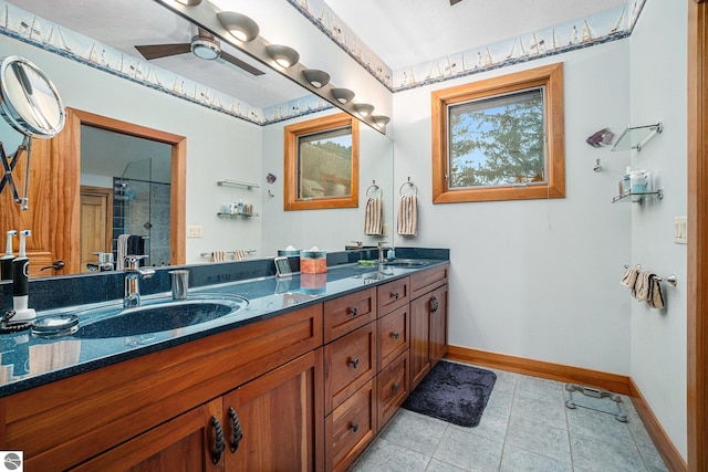 bathroom featuring vanity, tile patterned floors, and ceiling fan