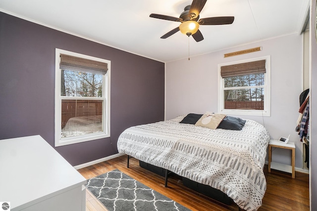 bedroom featuring ceiling fan and wood-type flooring