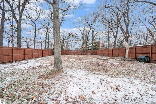 view of yard covered in snow