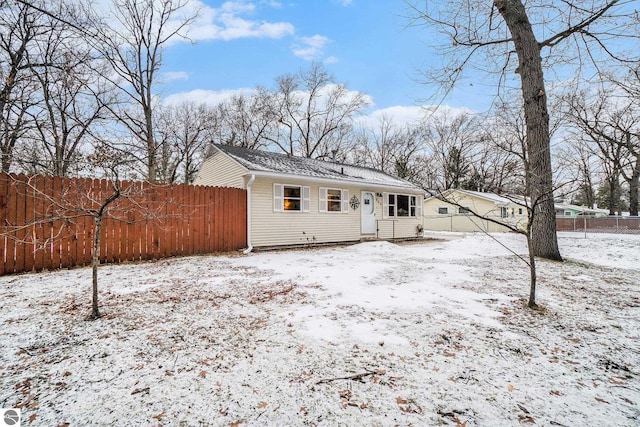 view of snow covered house